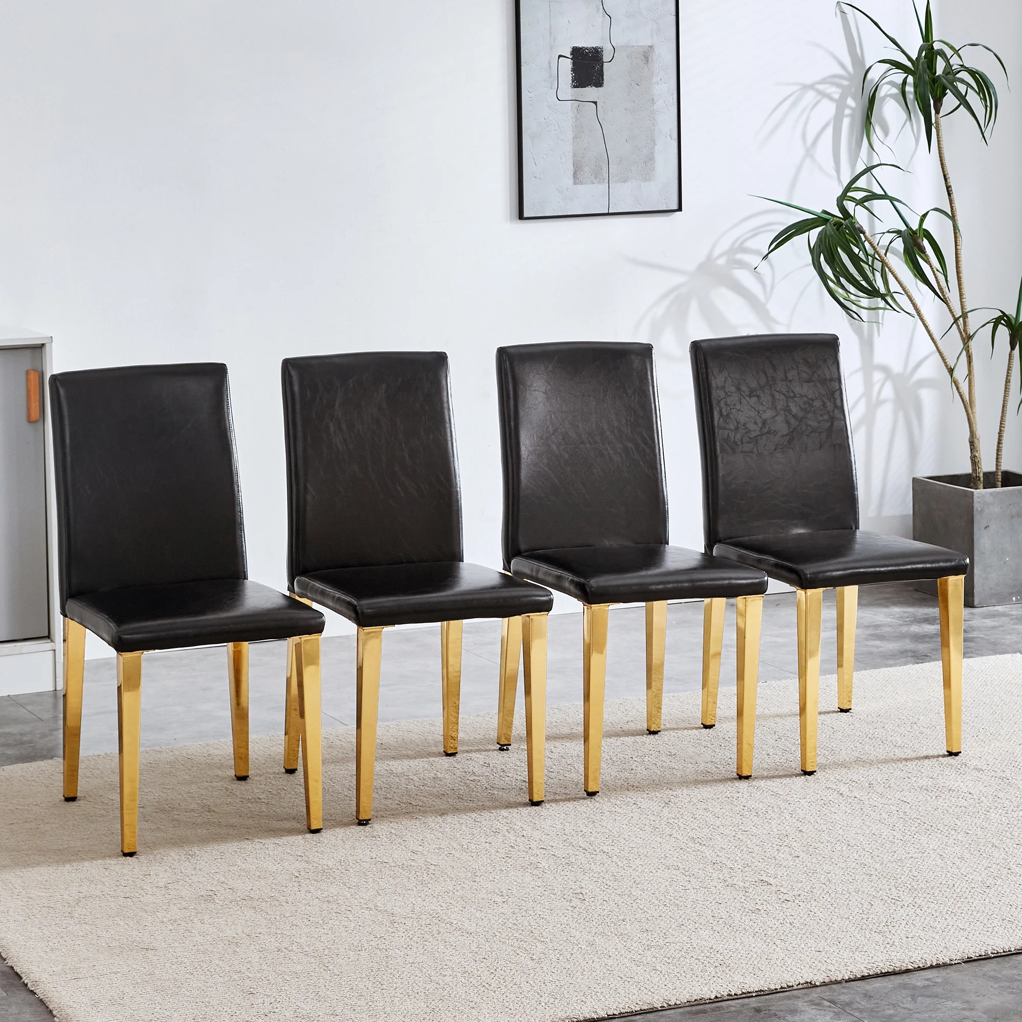 Set of 4 black PU leather backrest chairs with gold metal legs -A perfect pairing, ideal for minimalist and modern home decor styles, with product dimensions of 16.2*18.5*34.6 inches.